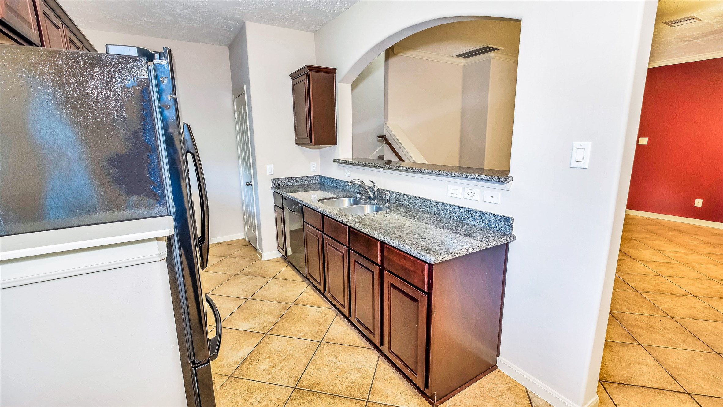 1724 Don Alejandro Houston, TX 77091 - Photo 11 of 32 a bathroom with a granite countertop sink and a mirror