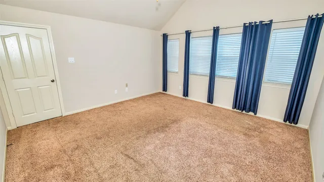 a view of a room with windows