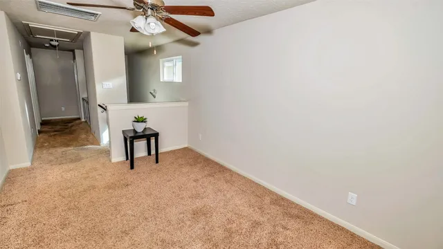 a view of an entryway with livingroom
