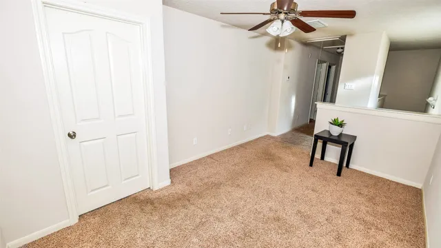 a view of a livingroom with closet and window