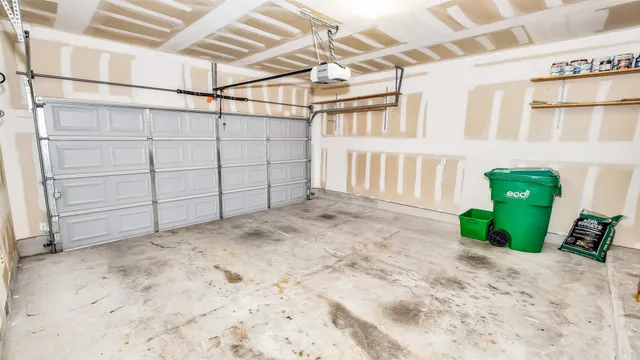 a view of an empty room with windows