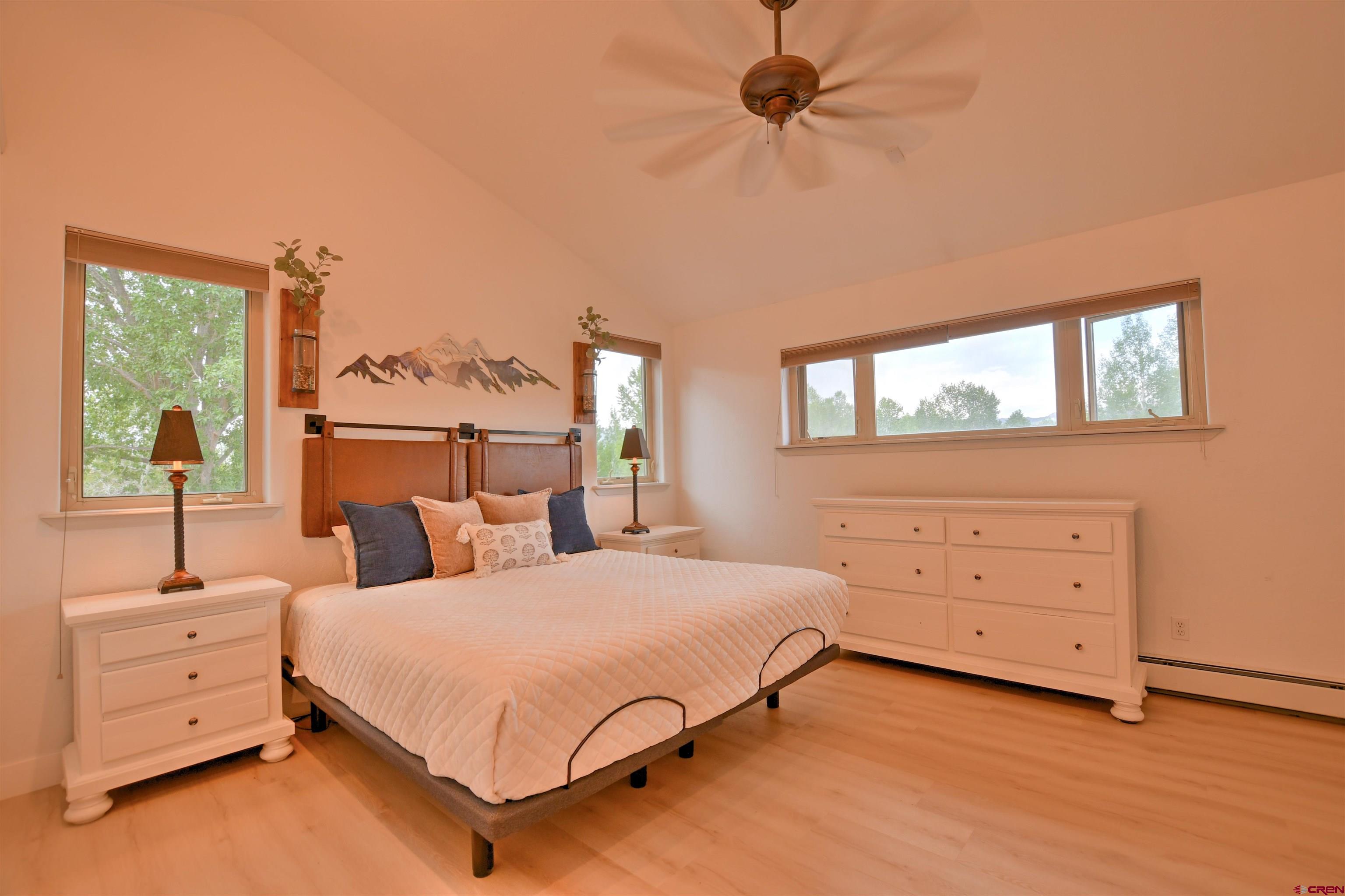 602 Chipeta Drive Ridgway, CO 81432 - Photo 15 of 41 a bedroom with a bed and a dresser