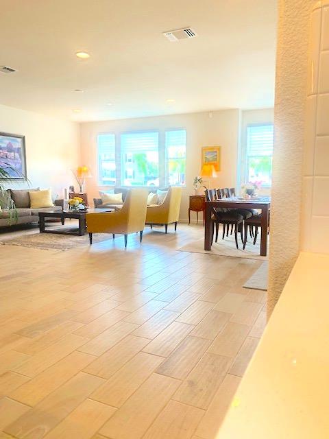 13217 Thomas Lane Marina, CA 93933 - Photo 13 of 35 a living room with furniture and a large window