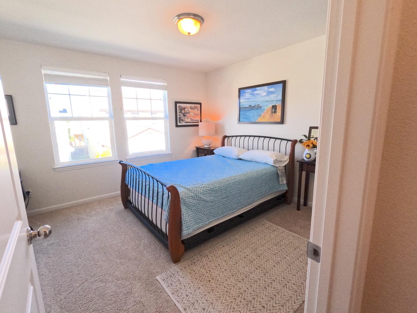 13217 Thomas Lane Marina, CA 93933 - Photo 17 of 35 a bedroom with a bed and window