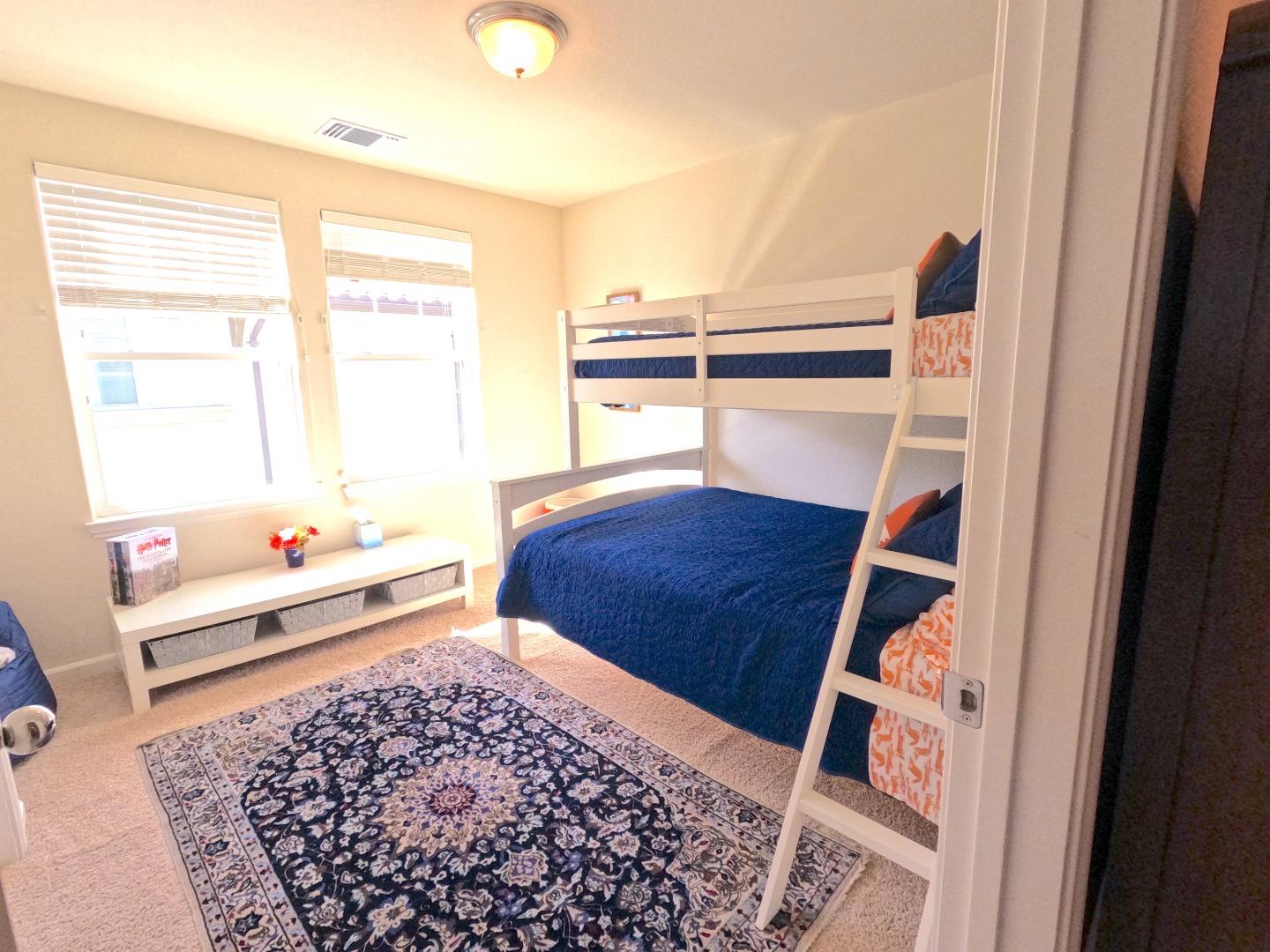 13217 Thomas Lane Marina, CA 93933 - Photo 18 of 35 a bedroom with a bed and a window