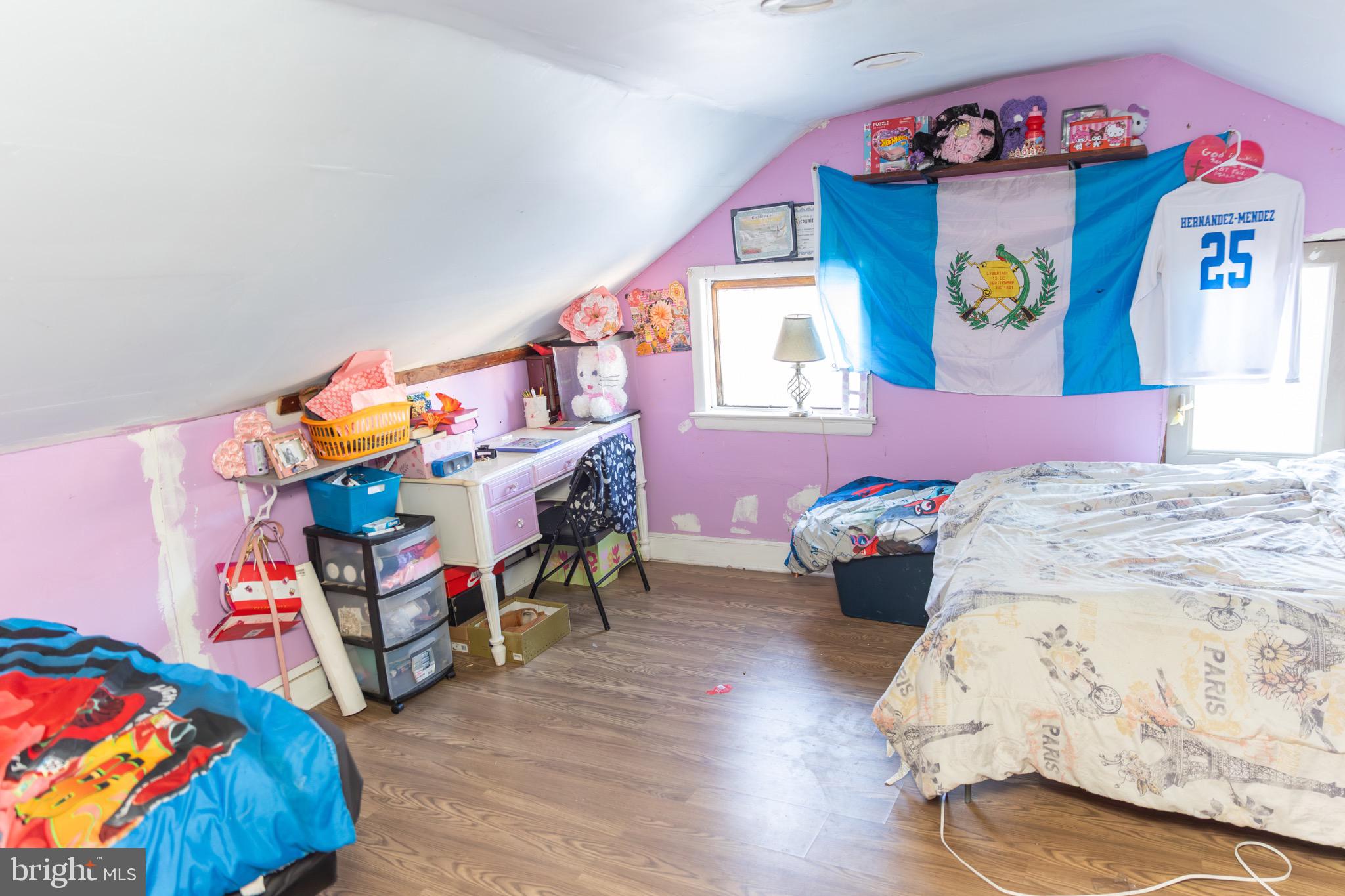 231 Laurel Street Minersville, PA 17954 - Photo 20 of 22 Cozy attic retreat with vibrant decor.