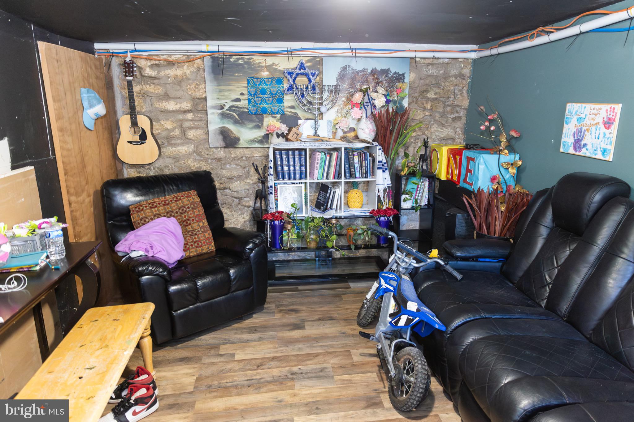 231 Laurel Street Minersville, PA 17954 - Photo 4 of 22 Cozy gathering space with artistic flair.