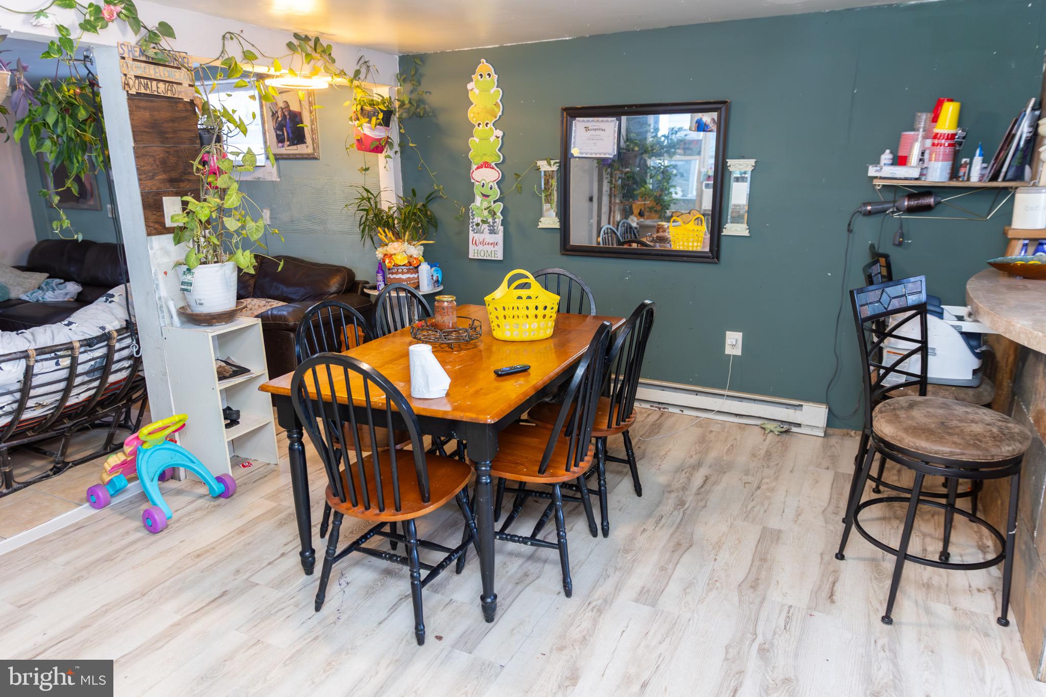 231 Laurel Street Minersville, PA 17954 - Photo 8 of 22 Cozy dining area with vibrant decor.