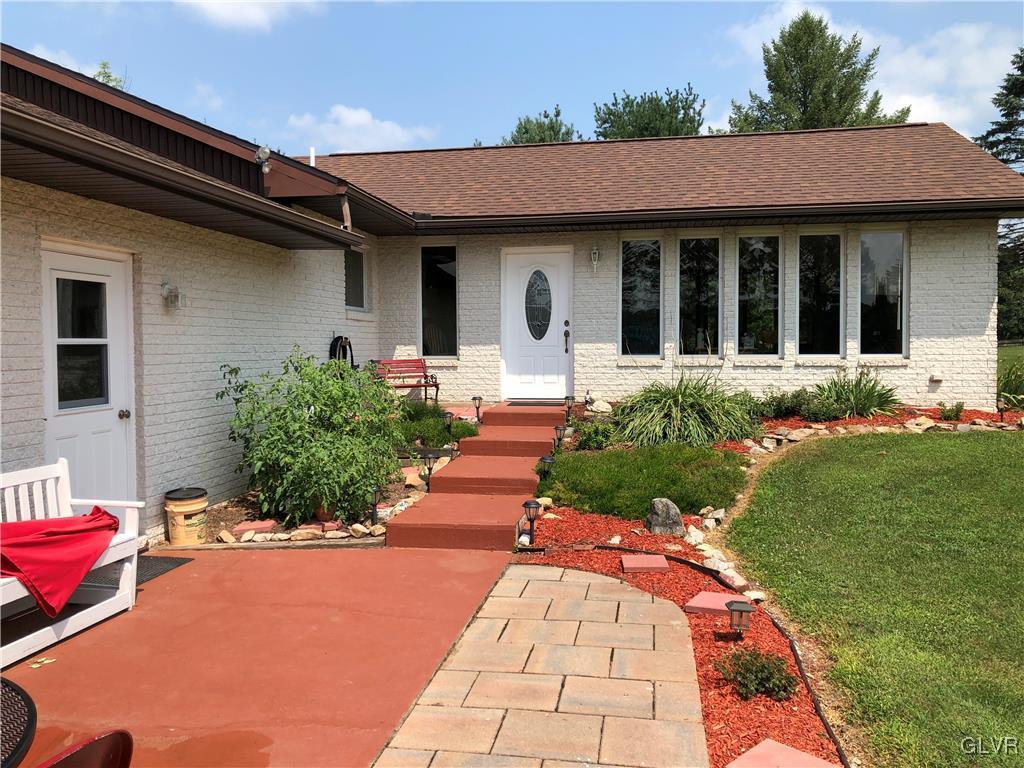 480 South Summit Road Bath, PA 18014 - Photo 29 of 31 a front view of a house with garden
