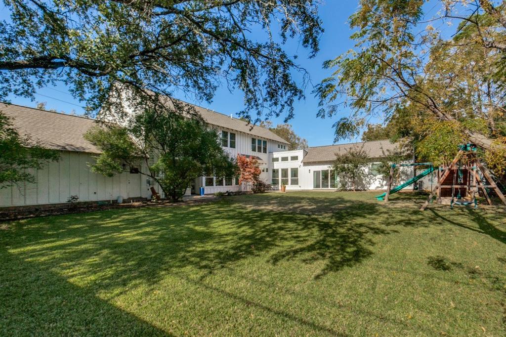 4206 Manning Lane Dallas, TX 75220 - Photo 32 of 35 a view of a house with a yard