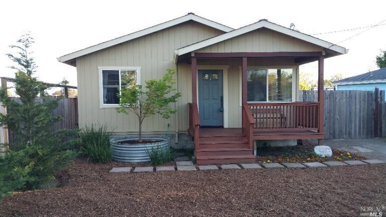 4182 Price Avenue Santa Rosa, CA 95407 - Photo 1 of 1 a front view of a house with garden