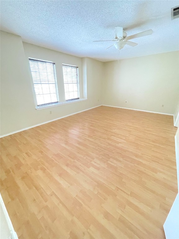 8501 Bismark Cove Austin, TX 78745 - Photo 17 of 24 a view of an empty room with a window