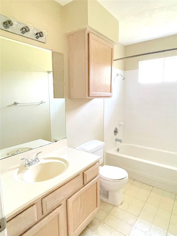 8501 Bismark Cove Austin, TX 78745 - Photo 19 of 24 a bathroom with a sink a toilet and a bathtub