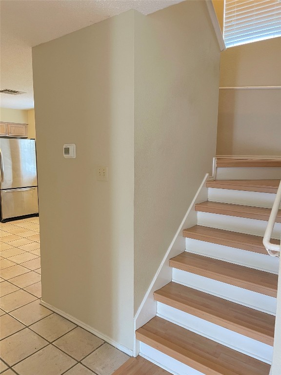 8501 Bismark Cove Austin, TX 78745 - Photo 8 of 24 a view of staircase with white walls