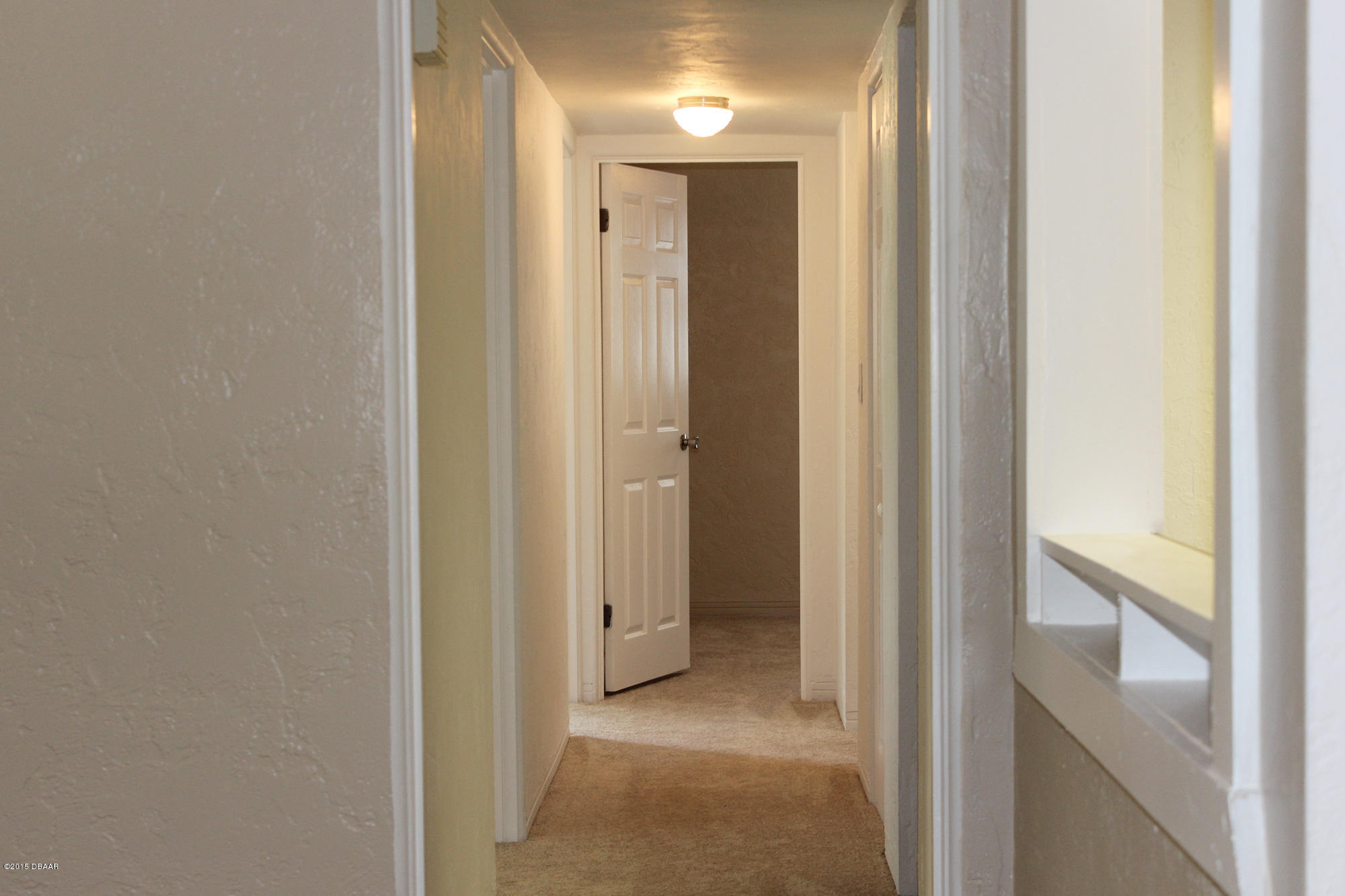 342 McIntosh Road Ormond Beach, FL 32174 - Photo 17 of 21 HallwayFromLivingRoom