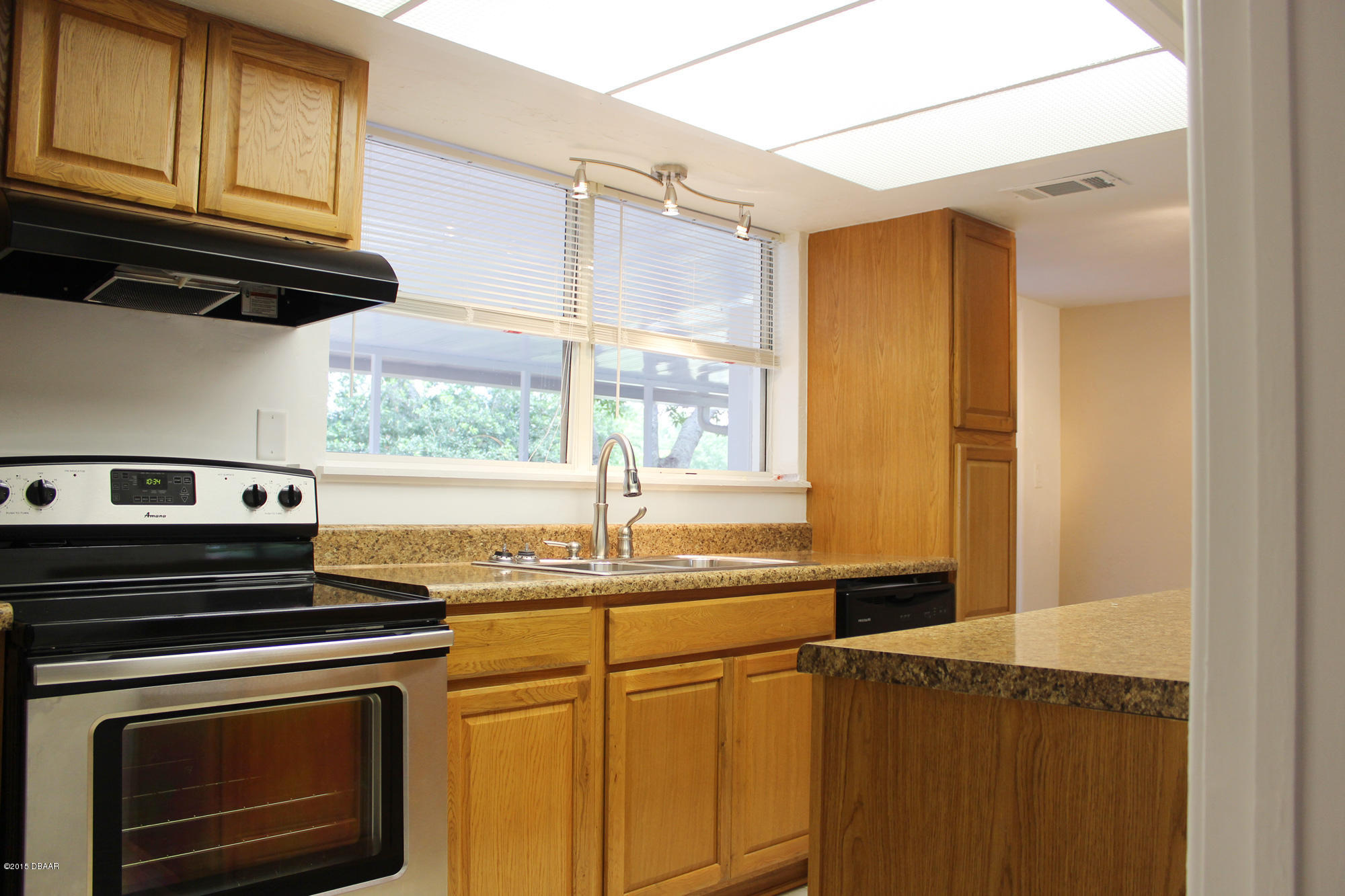 342 McIntosh Road Ormond Beach, FL 32174 - Photo 18 of 21 KitchenFromHallway