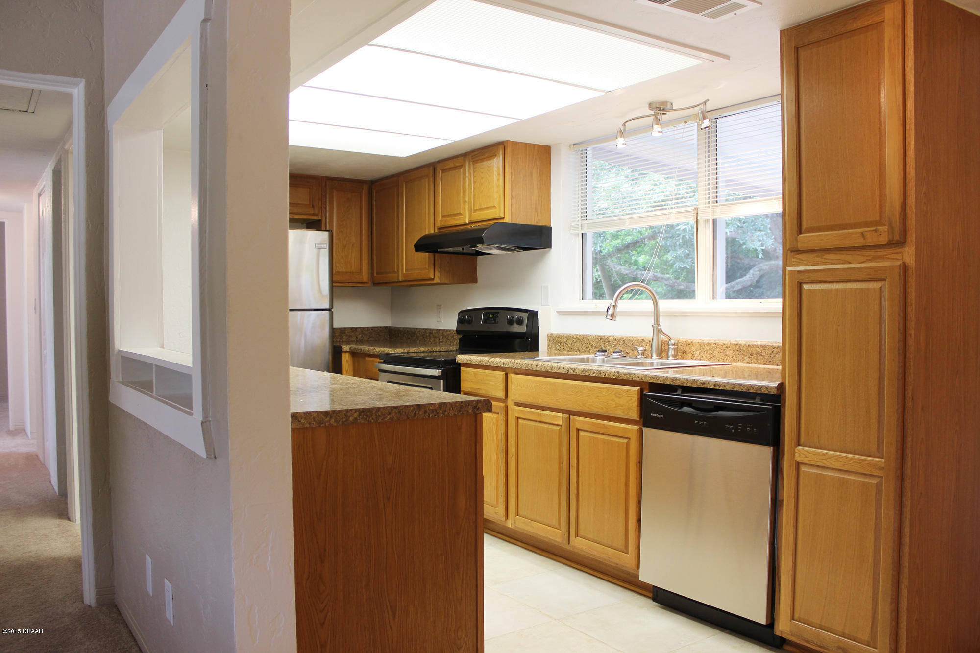 342 McIntosh Road Ormond Beach, FL 32174 - Photo 19 of 21 KitchenFromLivingRoom