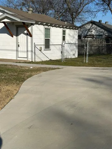 a view of a house with a park