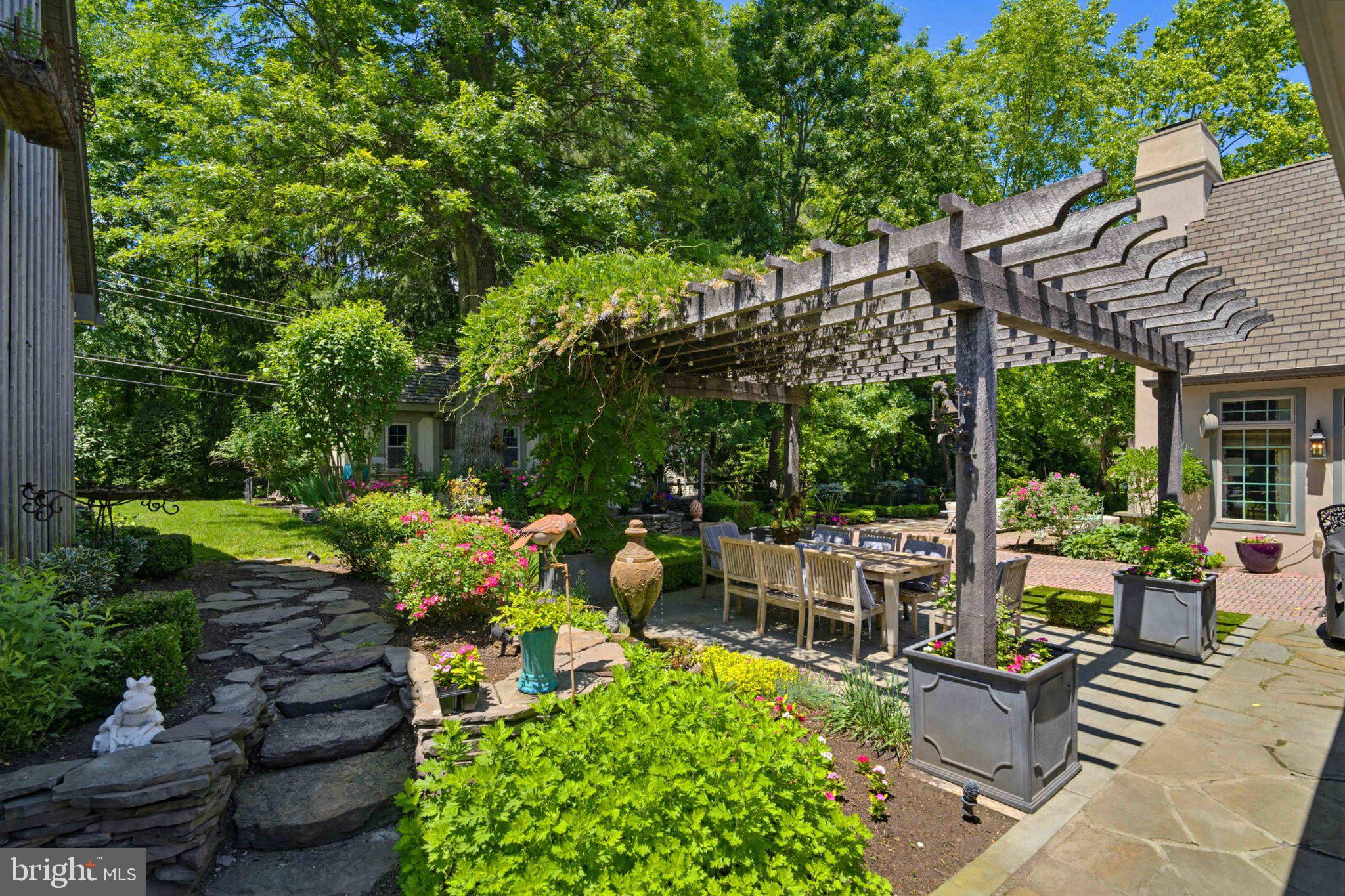 2244 Deer Path Road Huntingdon Valley, PA 19006 - Photo 77 of 95 Lush garden oasis with charming pergola.