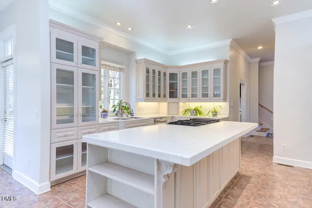 a bathroom with a tub a sink and a bathtub