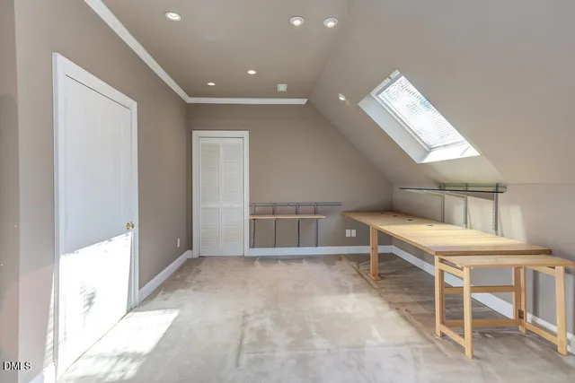 wooden floor with white walls and ceiling fan