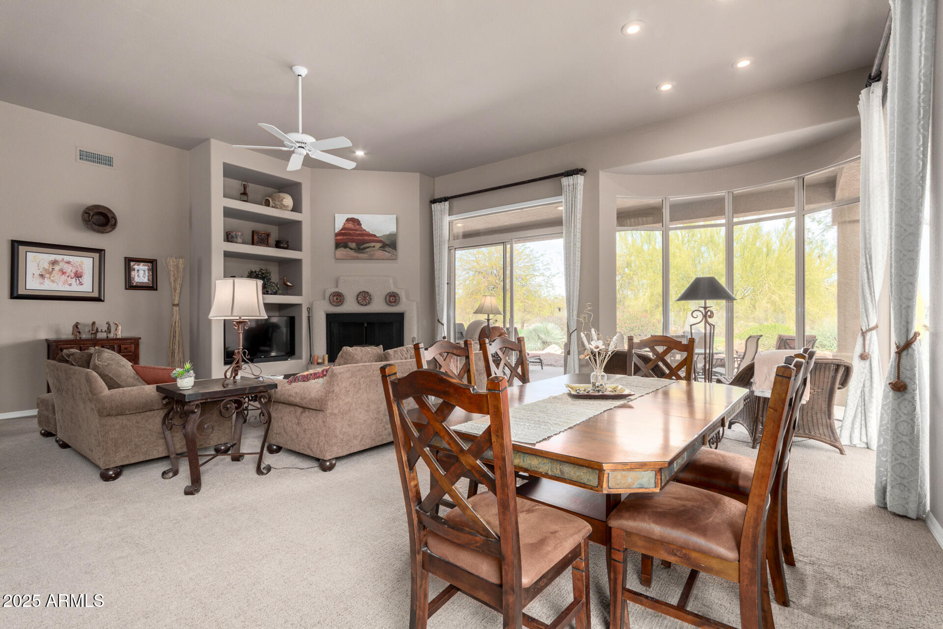 18610 Amarado Circle Rio Verde, AZ 85263 - Photo 14 of 58 a view of a dining room with furniture window and wooden floor