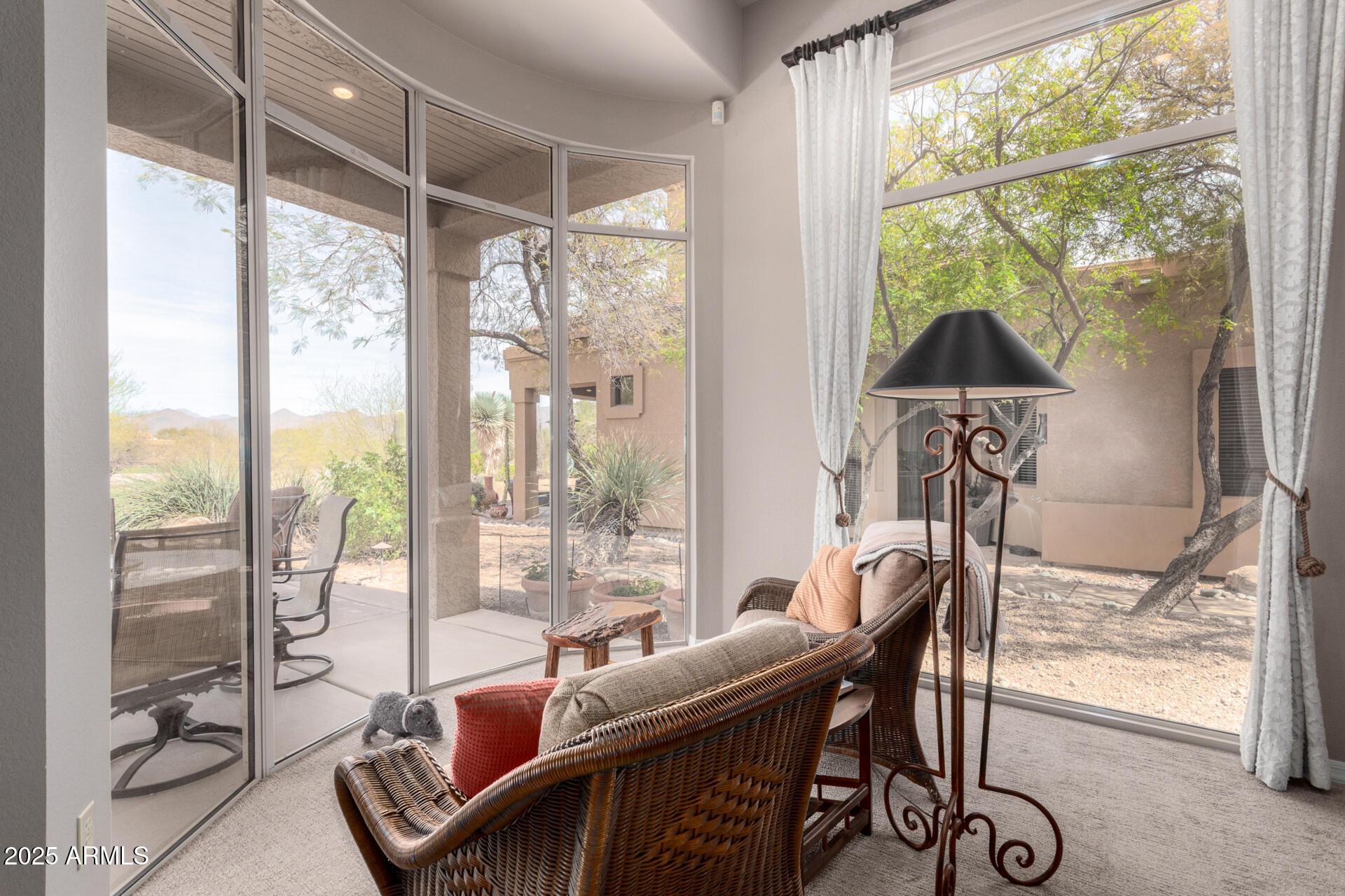 18610 Amarado Circle Rio Verde, AZ 85263 - Photo 2 of 58 a living room with furniture and a window