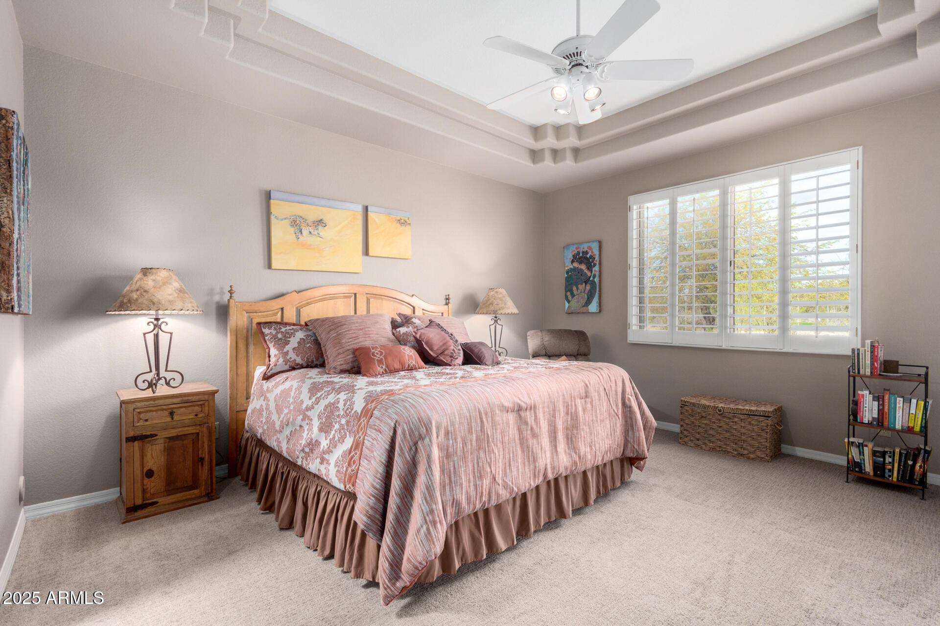 18610 Amarado Circle Rio Verde, AZ 85263 - Photo 21 of 58 a spacious bedroom with two beds and a chandelier