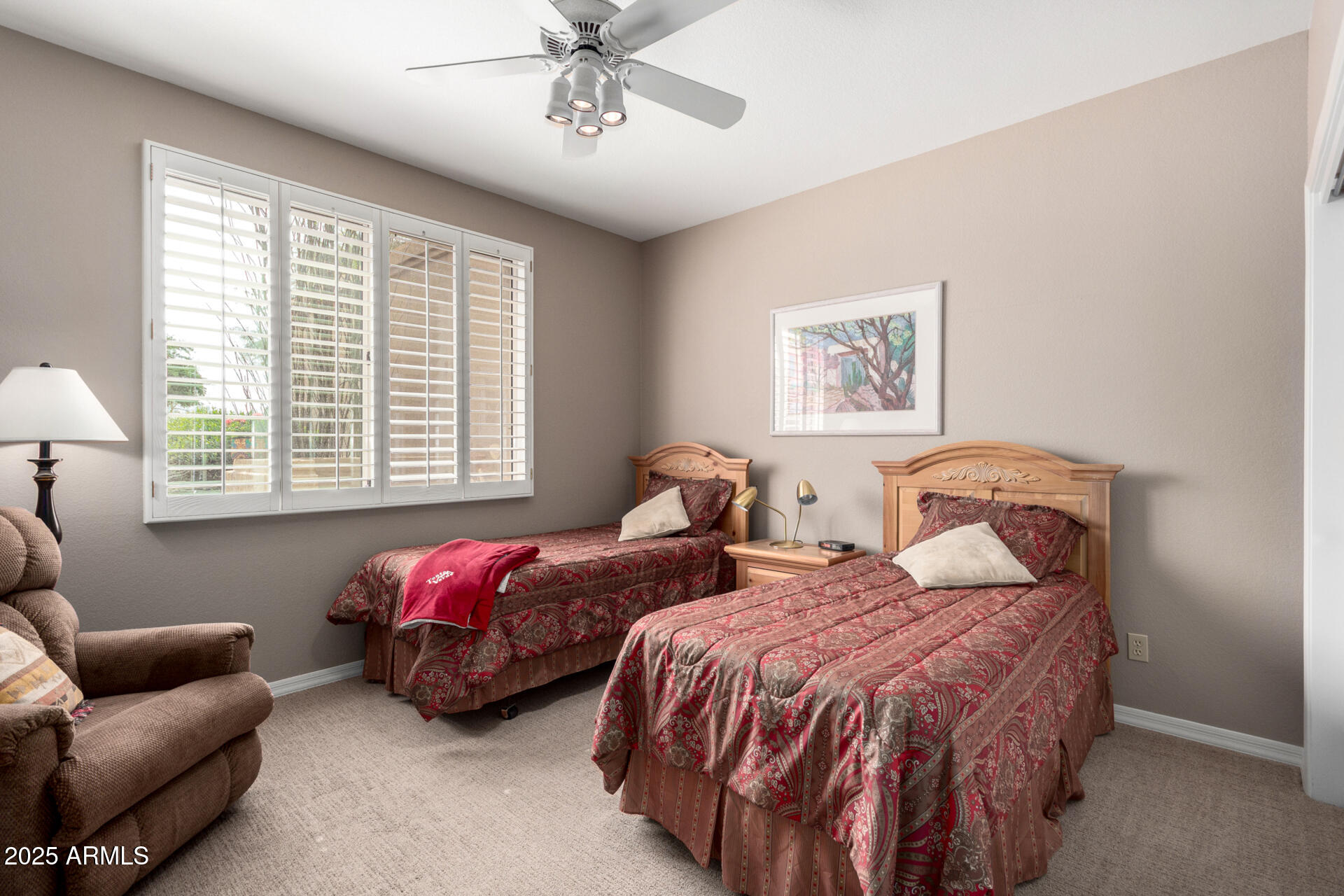 18610 Amarado Circle Rio Verde, AZ 85263 - Photo 30 of 58 a bedroom with two beds and a couch