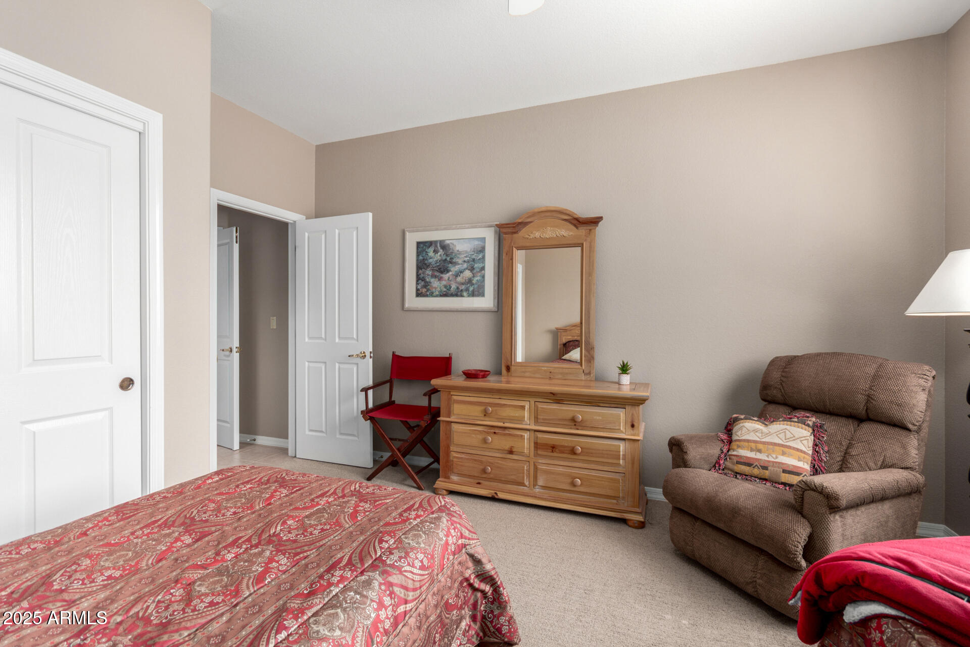 18610 Amarado Circle Rio Verde, AZ 85263 - Photo 31 of 58 a bedroom with furniture and a couch