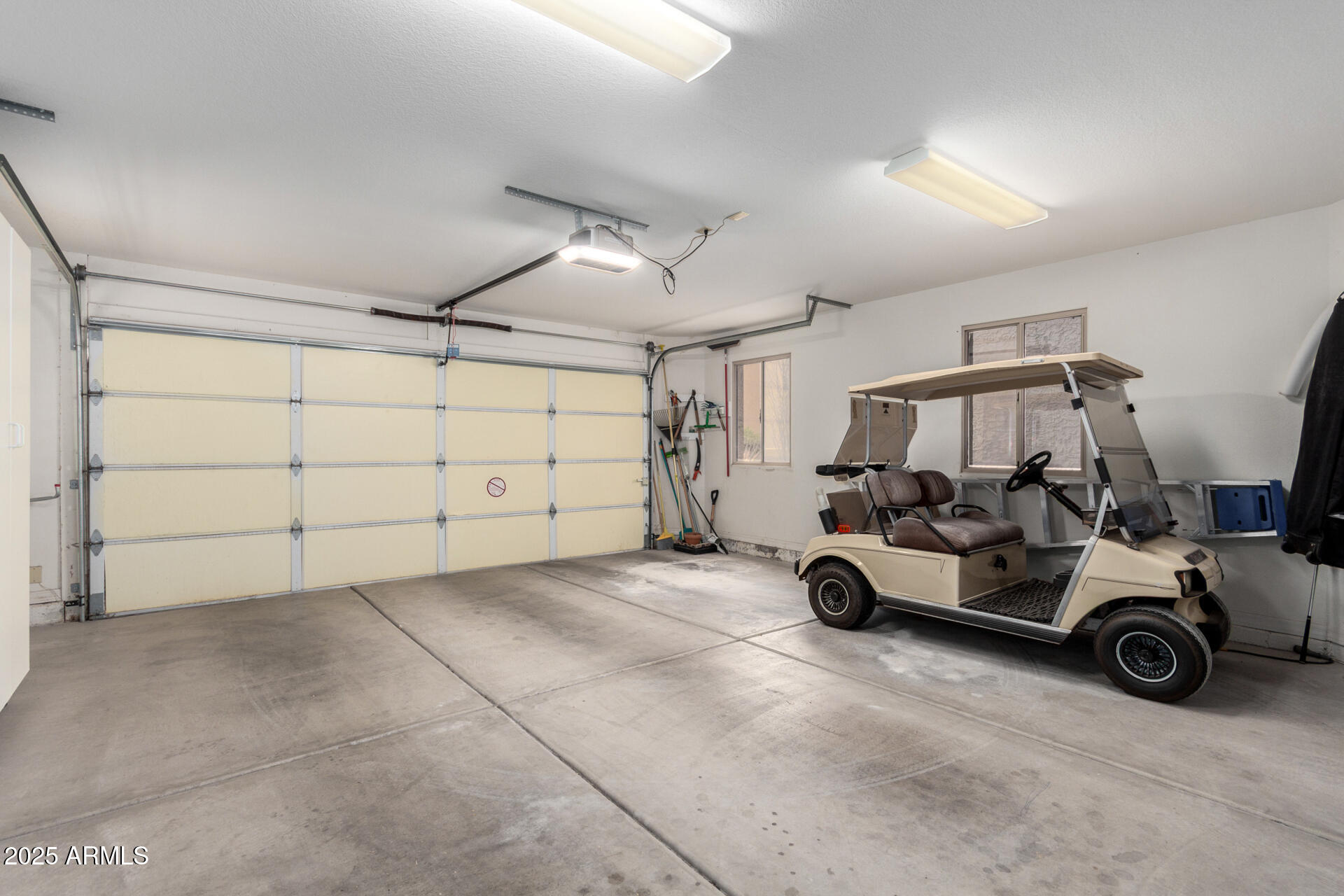 18610 Amarado Circle Rio Verde, AZ 85263 - Photo 38 of 58 a view of a garage with cars