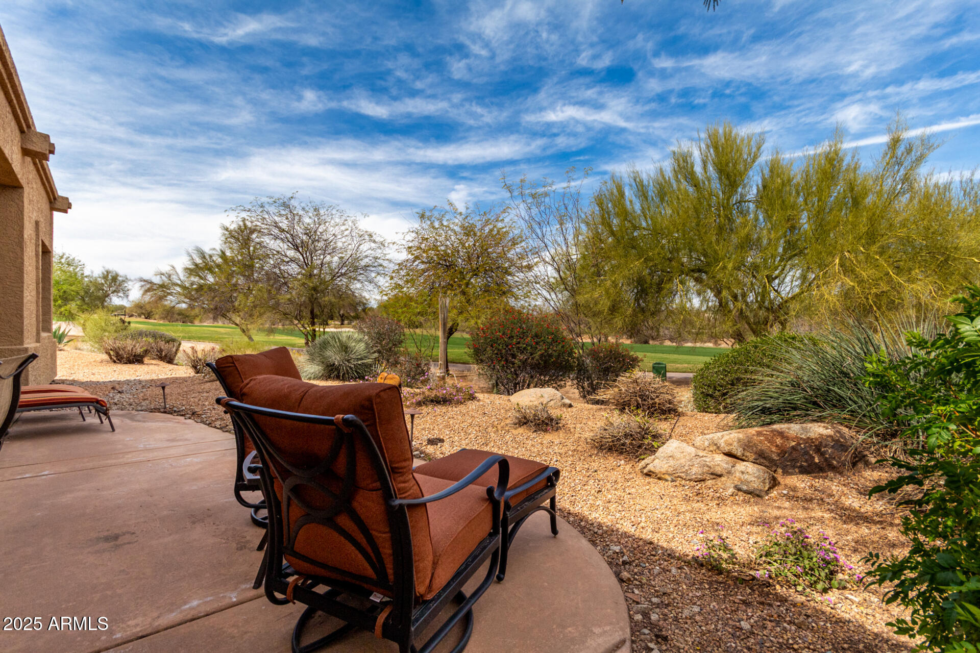 18610 Amarado Circle Rio Verde, AZ 85263 - Photo 42 of 58 a view of a chairs and table in the patio