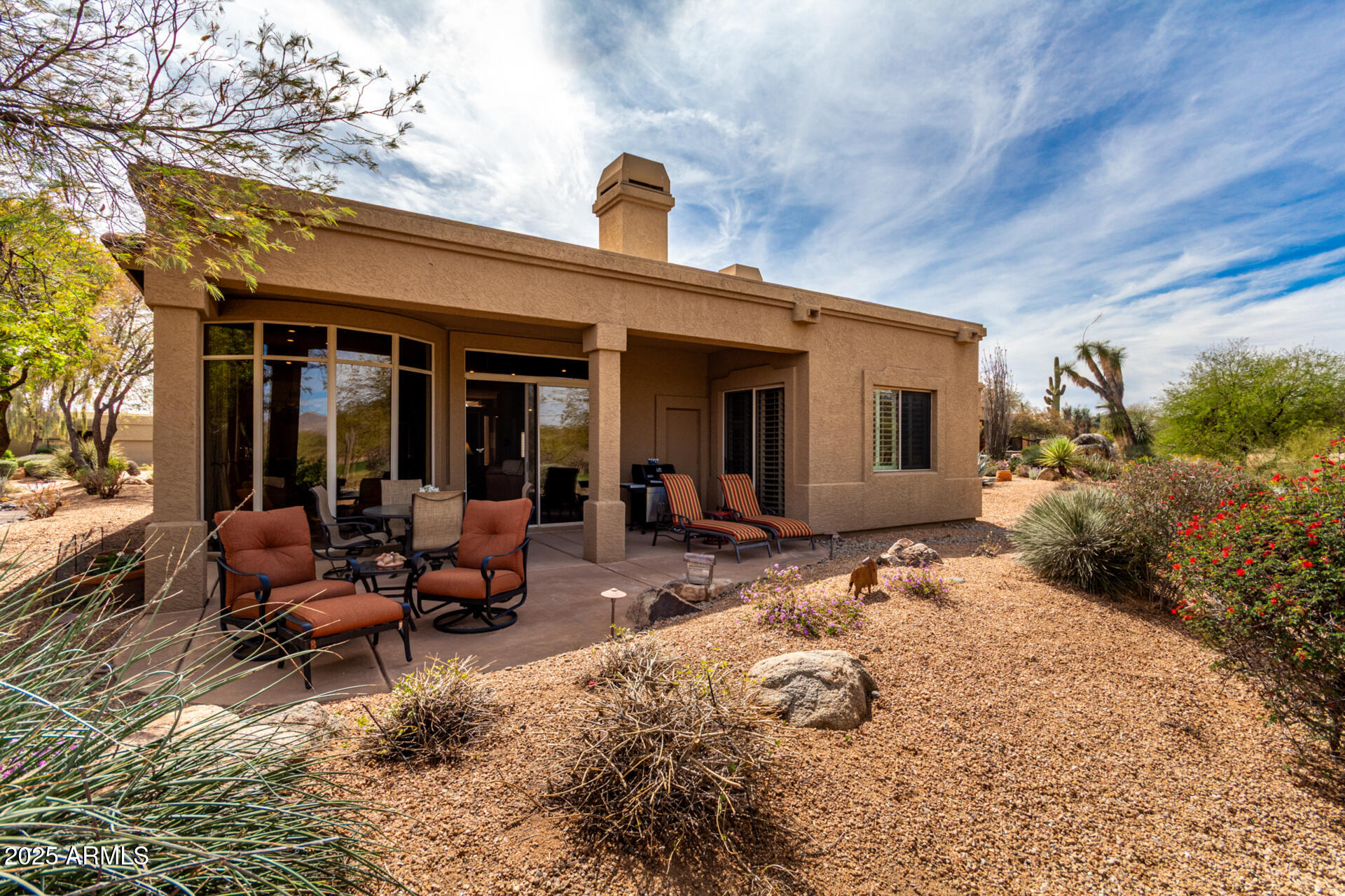 18610 Amarado Circle Rio Verde, AZ 85263 - Photo 45 of 58 a view of a house with backyard sitting area and porch