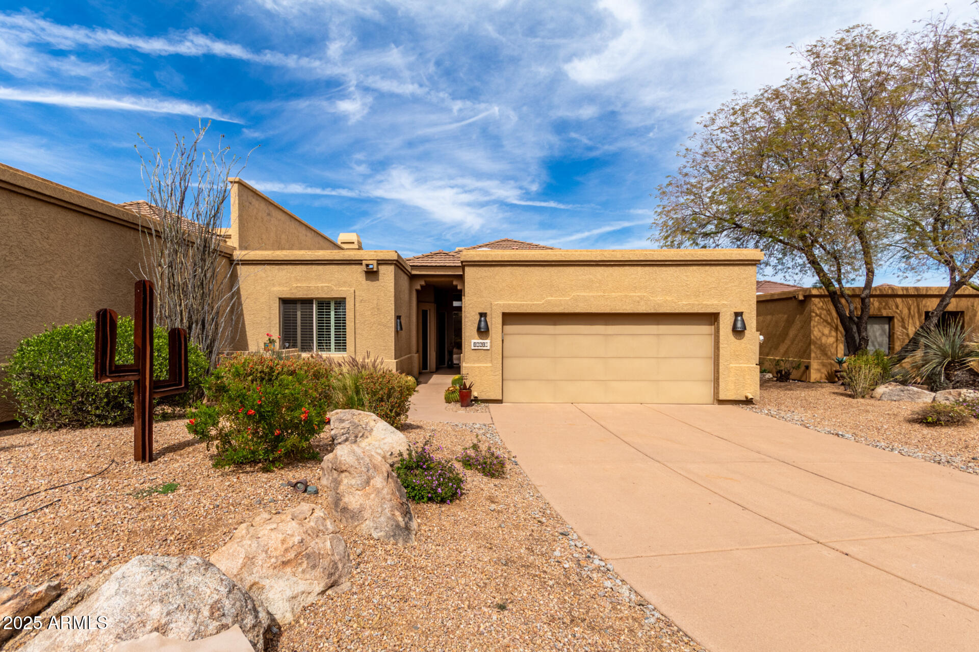 18610 Amarado Circle Rio Verde, AZ 85263 - Photo 5 of 58 a front view of a house with a yard