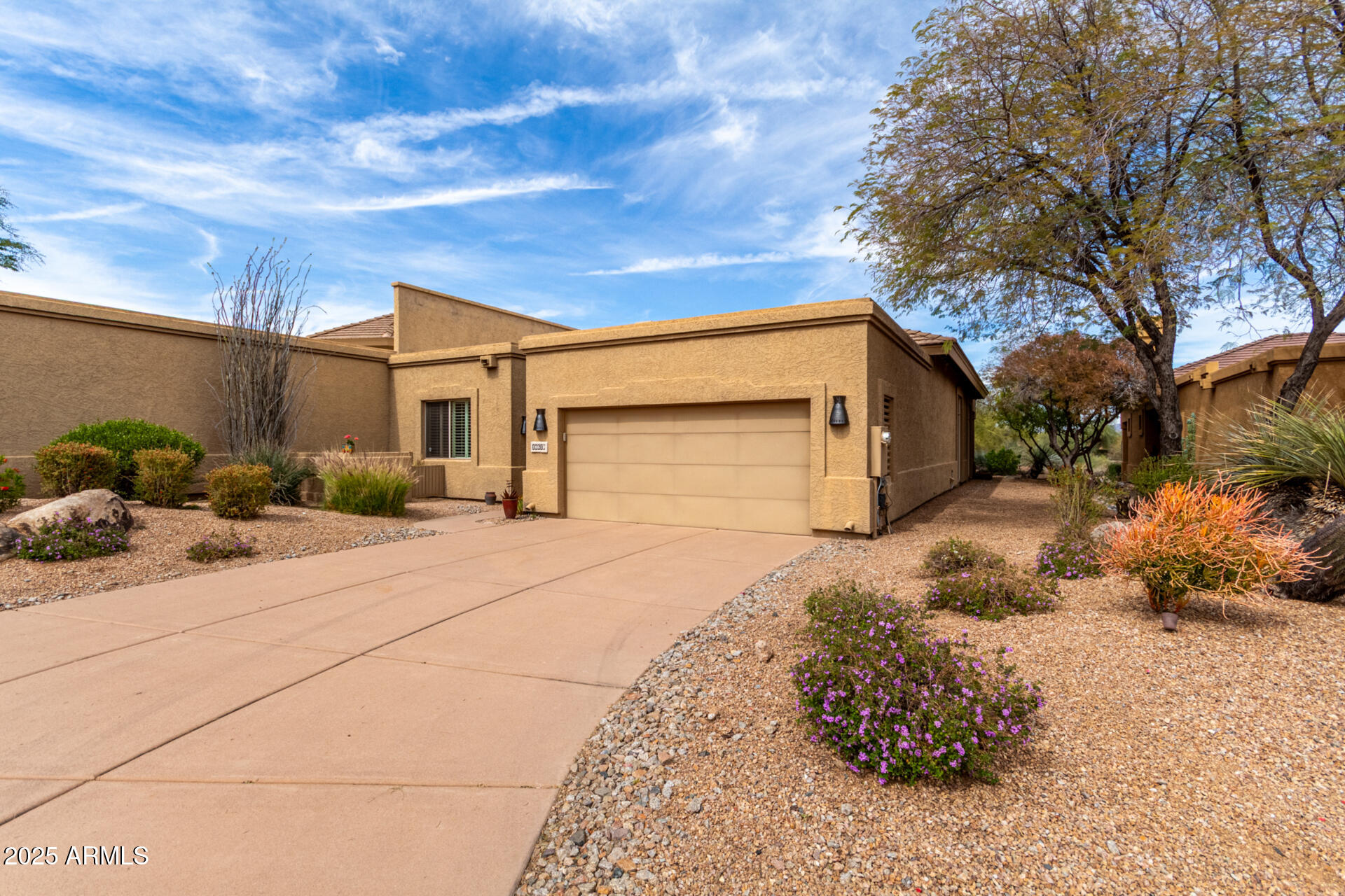 18610 Amarado Circle Rio Verde, AZ 85263 - Photo 6 of 58 a front view of a house with a yard