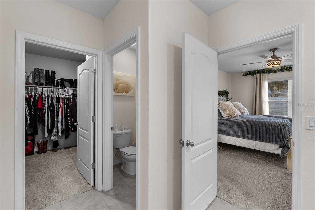 1523 White Hawk Way Groveland, FL 34736 - Photo 21 of 24 a living room with furniture and a walk in closet