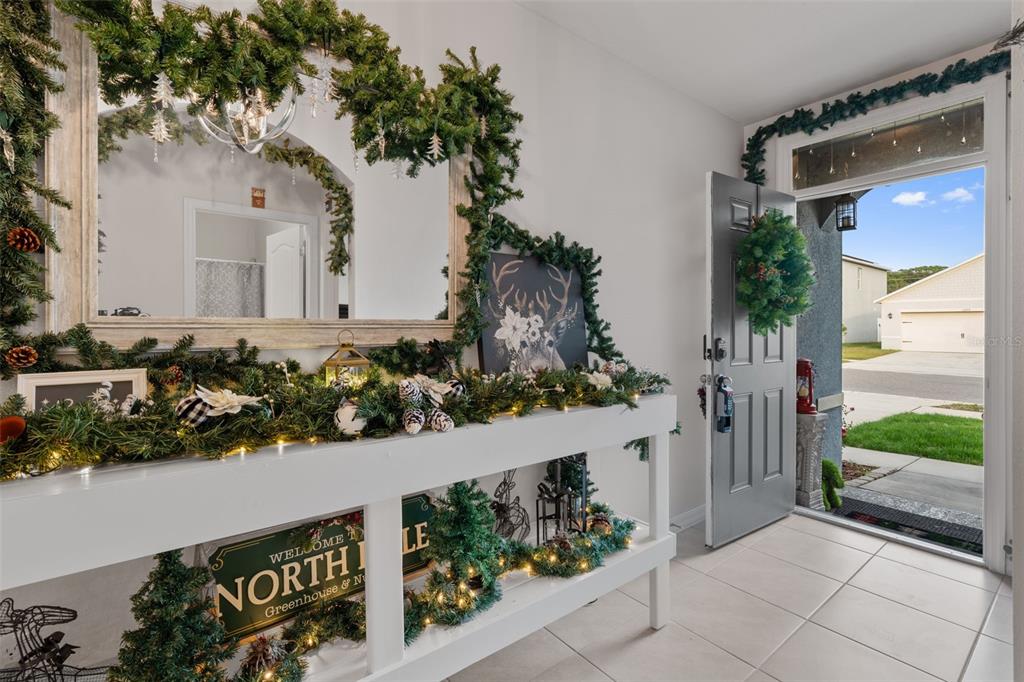 1523 White Hawk Way Groveland, FL 34736 - Photo 3 of 24 a front view of a house with garden