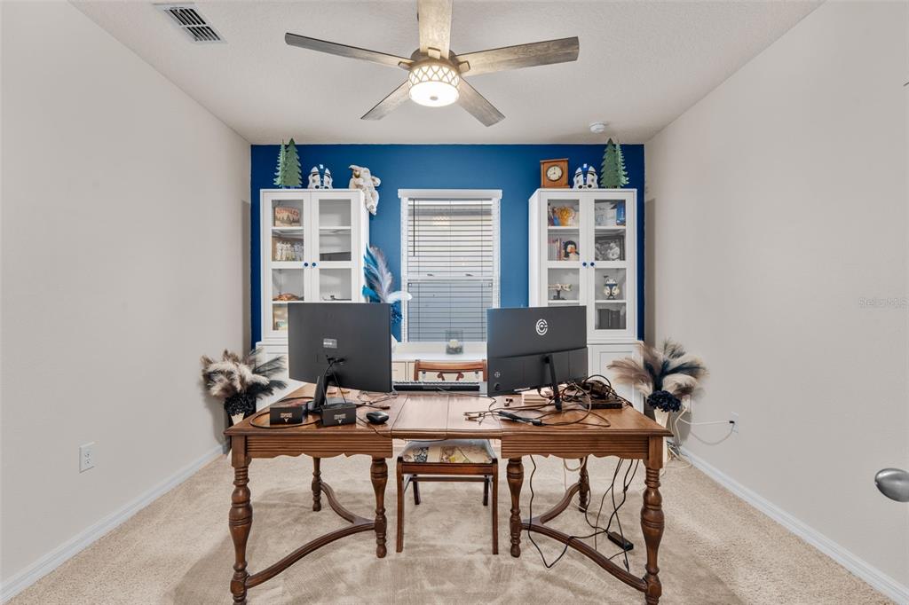 1523 White Hawk Way Groveland, FL 34736 - Photo 9 of 24 a view of a workspace with furniture