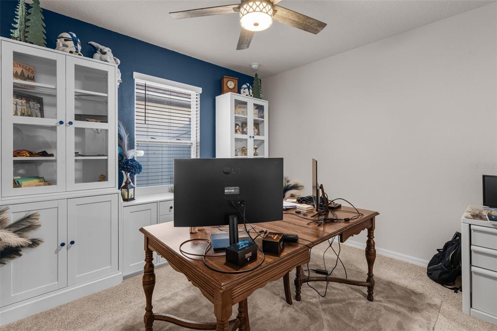 1523 White Hawk Way Groveland, FL 34736 - Photo 10 of 24 a view of a workspace with furniture