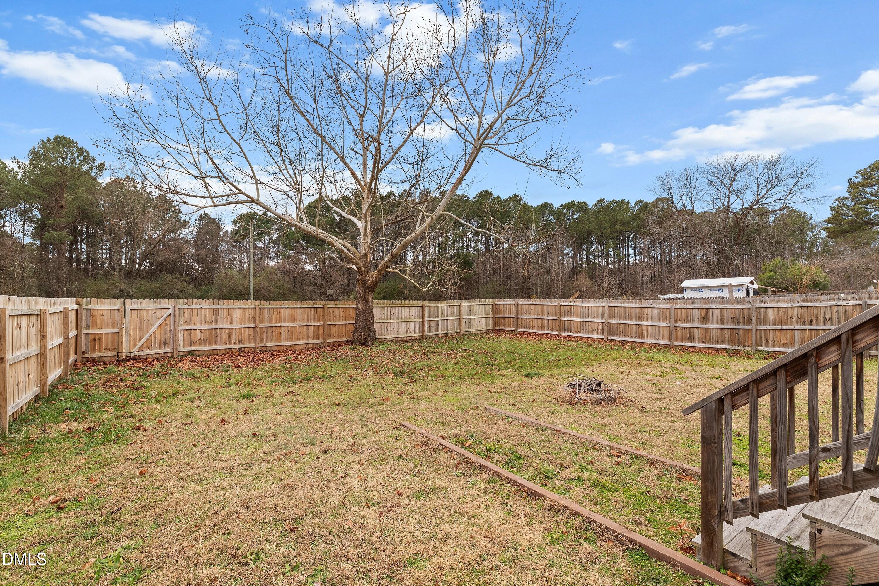 1932 Ranch Mill Circle Raleigh, NC 27610 - Photo 26 of 29 1932 Ranch Mill Cir_4316 bk yd