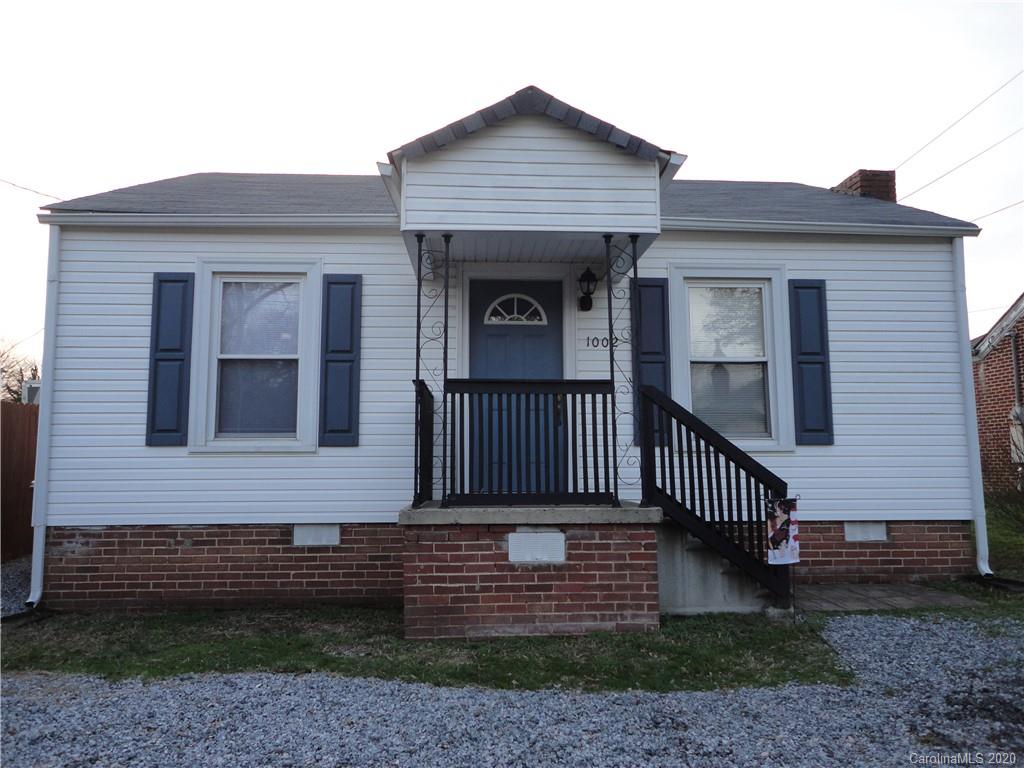 1002 South Ridge Avenue Kannapolis, NC 28083 - Photo 1 of 9 a front view of a house with garden