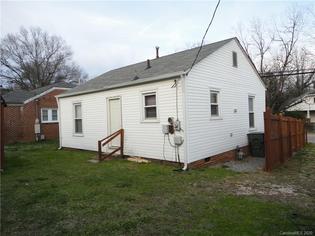 1002 South Ridge Avenue Kannapolis, NC 28083 - Photo 8 of 9 a view of a backyard with a garden