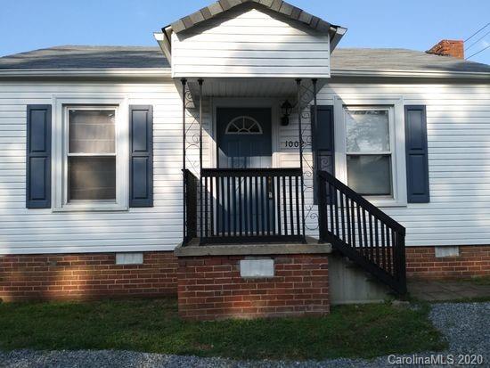 1002 South Ridge Avenue Kannapolis, NC 28083 - Photo 9 of 9 a view of front door of house with stairs