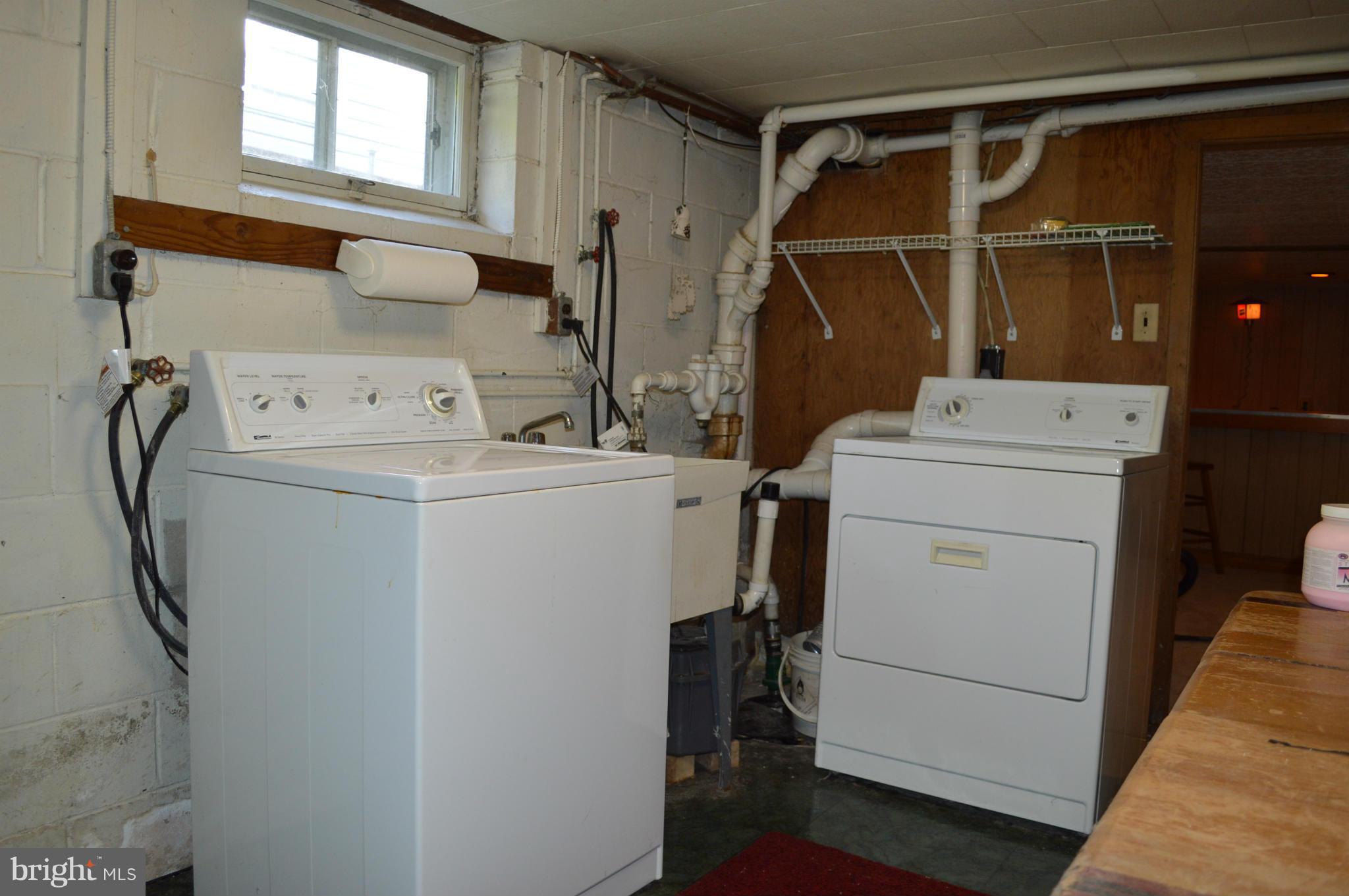 943 Bowleys Quarters Road Baltimore, MD 21220 - Photo 21 of 29 a utility room with dryer and washer