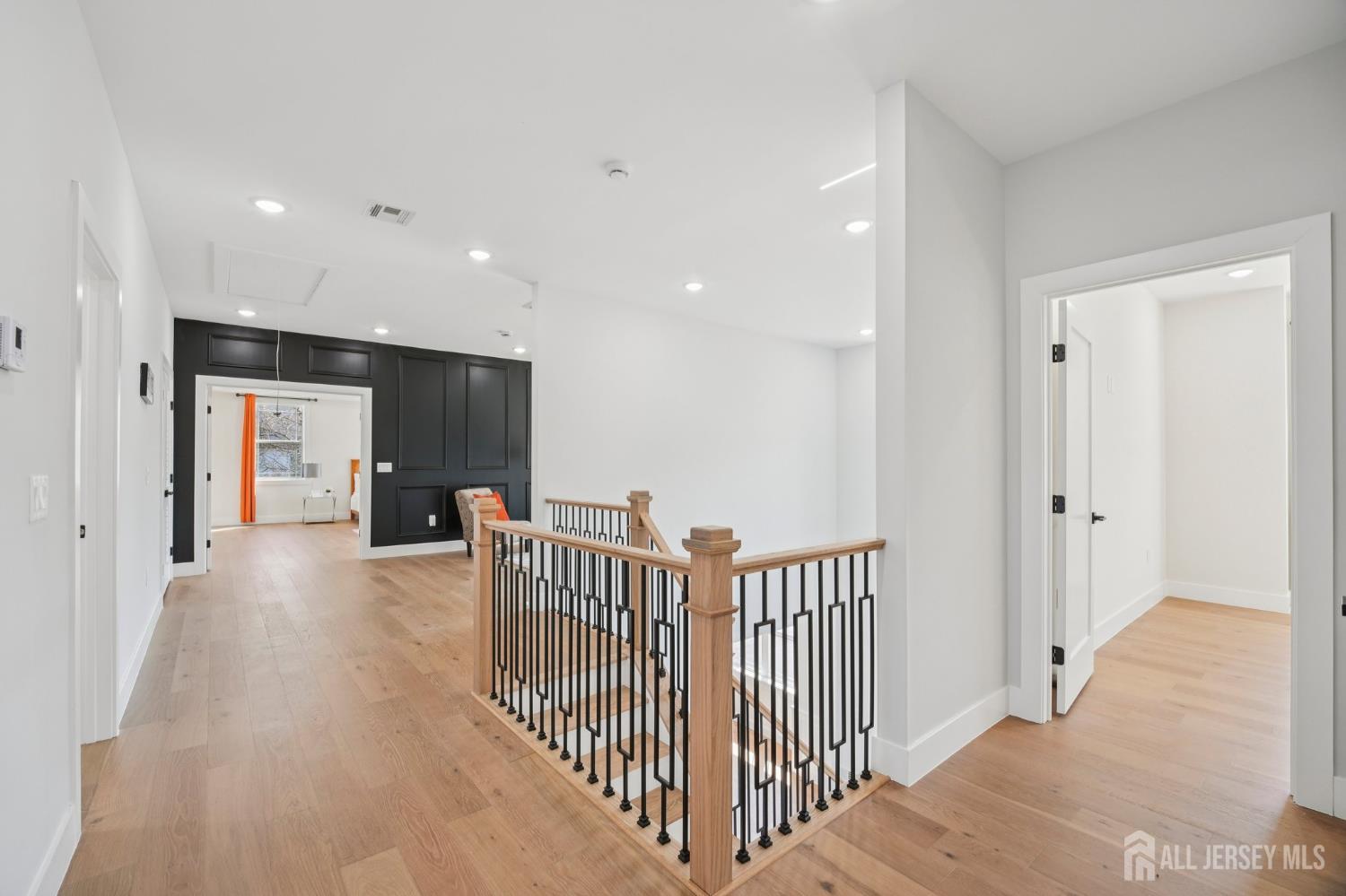 75 Jefferson Boulevard Edison, NJ 08817 - Photo 26 of 75 a view of a hallway with a bedroom and windows