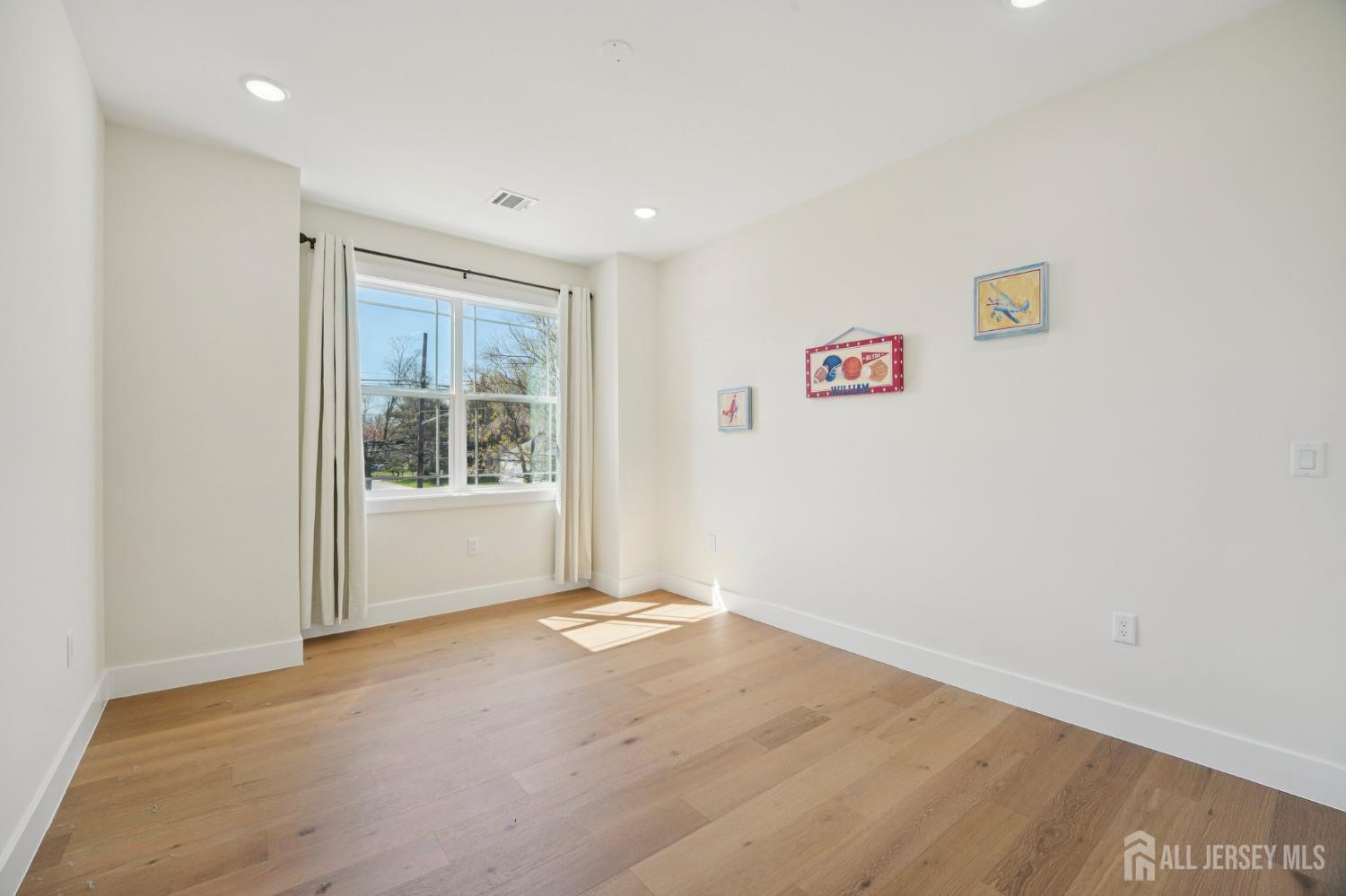 75 Jefferson Boulevard Edison, NJ 08817 - Photo 32 of 75 a view of an empty room with a window