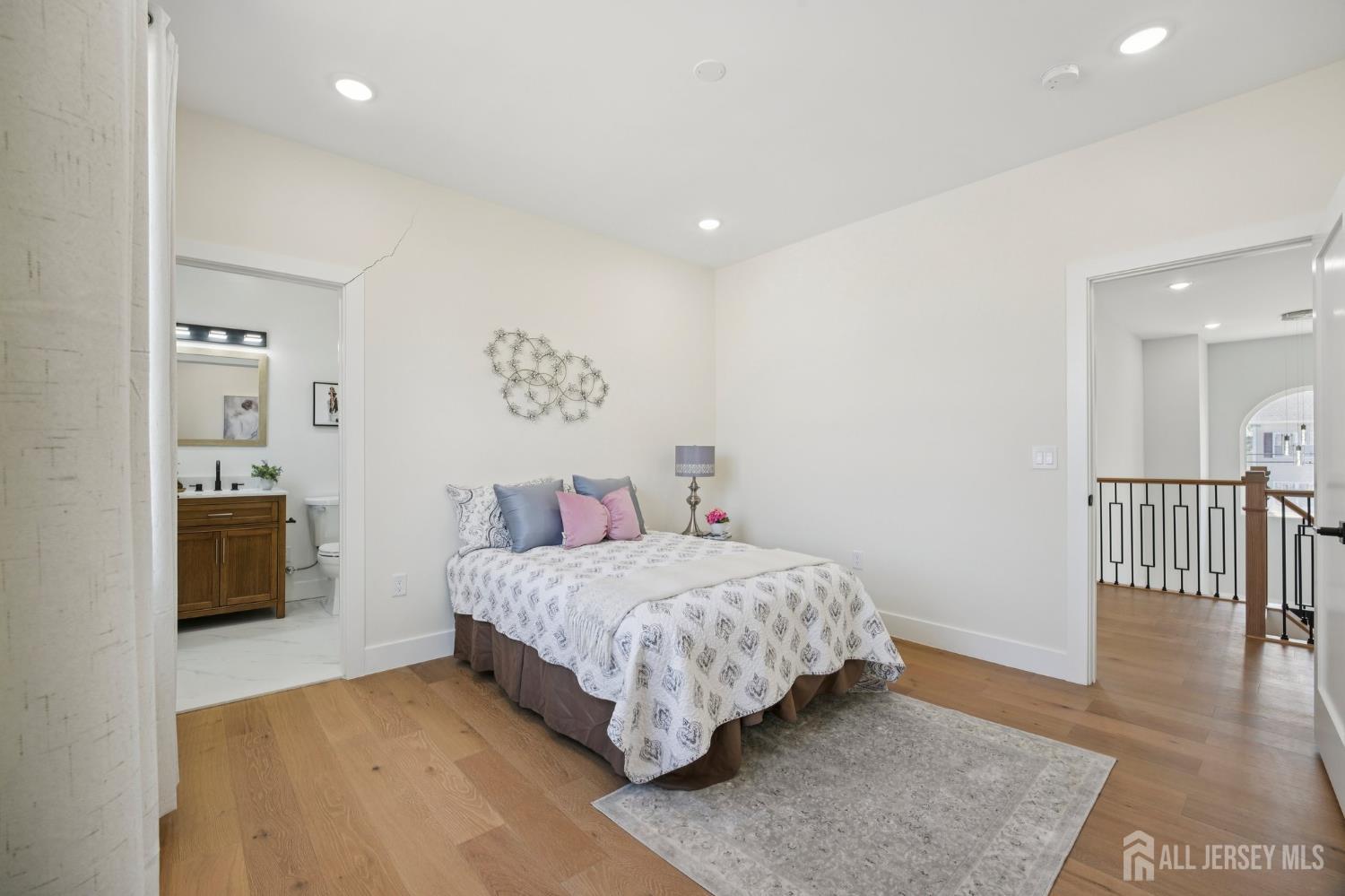 75 Jefferson Boulevard Edison, NJ 08817 - Photo 38 of 75 a bedroom with a bed and a table