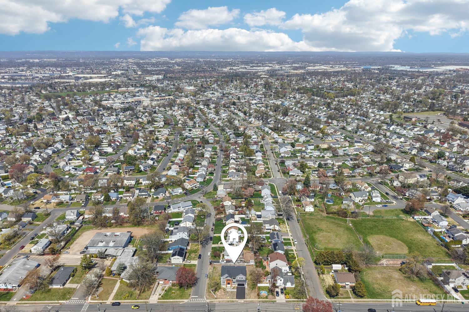75 Jefferson Boulevard Edison, NJ 08817 - Photo 69 of 75 an aerial view of residential houses with outdoor space