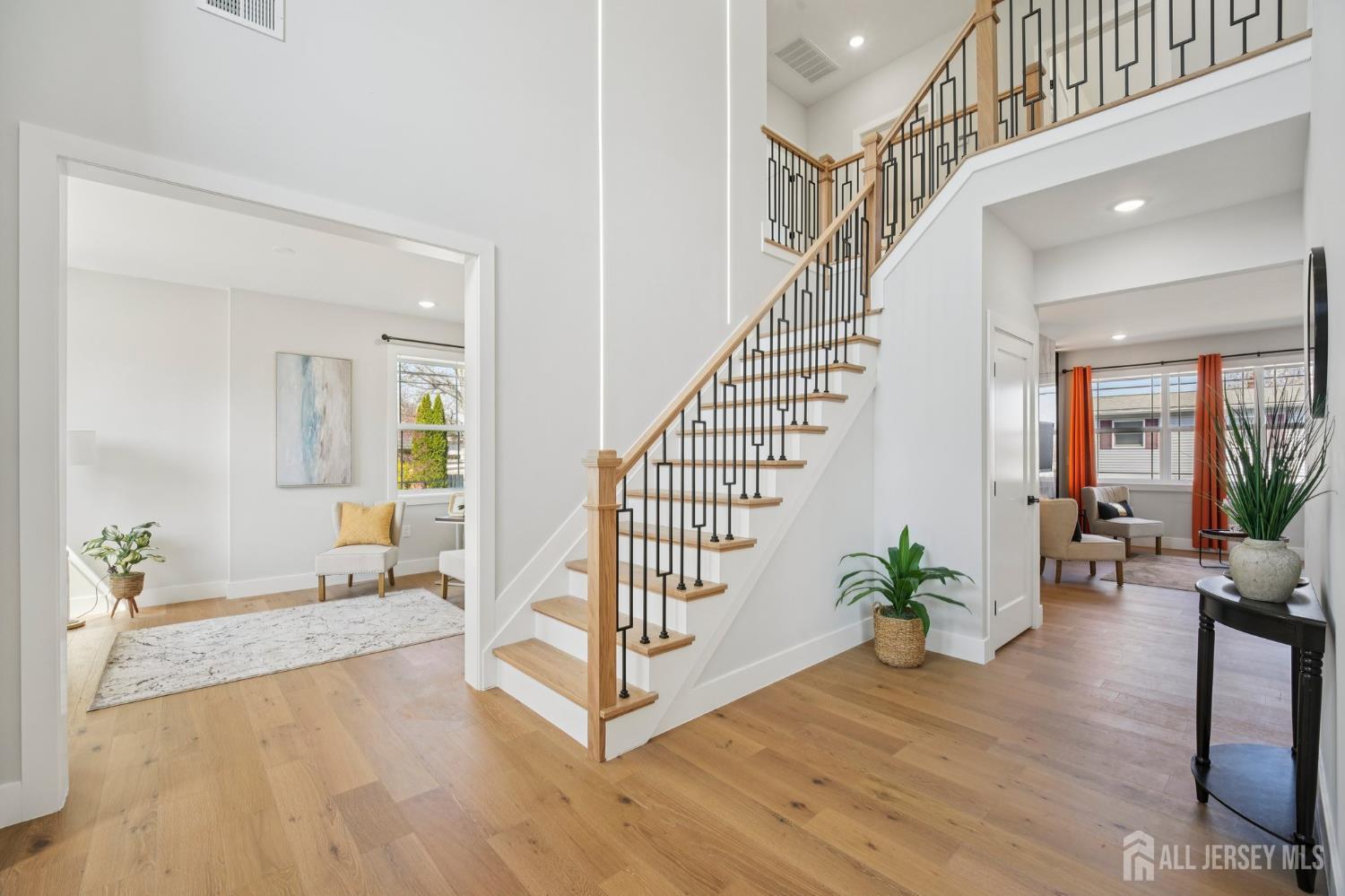 75 Jefferson Boulevard Edison, NJ 08817 - Photo 7 of 75 a view of entryway with wooden floor and furniture