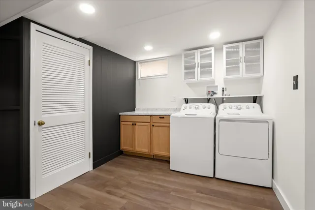 a utility room with dryer and washer